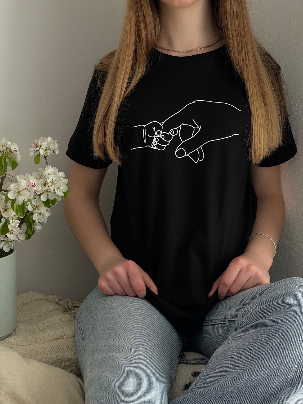 schwarzes T-shirt "Erster Moment" bedruckt mit kurzem Arm